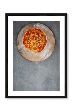 Fresh pizza on wooden cutting board