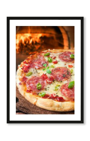 Freshly baked pepperoni or salami pizza