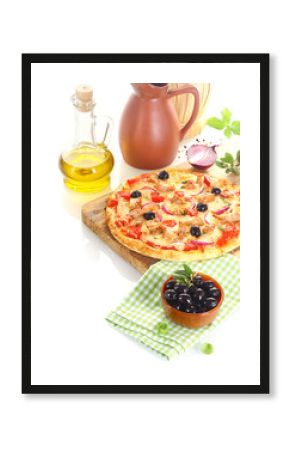 Pizza surrounded by the ingredients