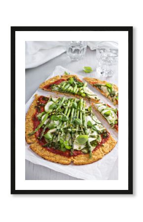 Cauliflower pizza with zucchini and asparagus