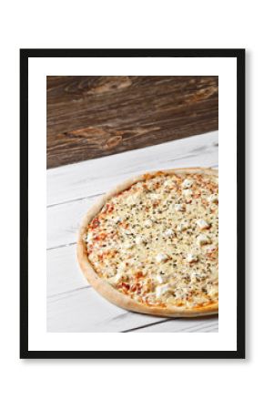 Delicious four cheeses pizza served on wooden table. quattro formagio