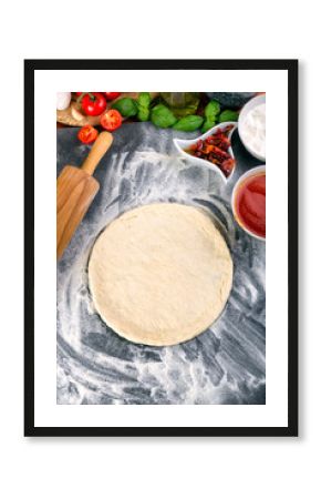 Prepering pizza dough for baking