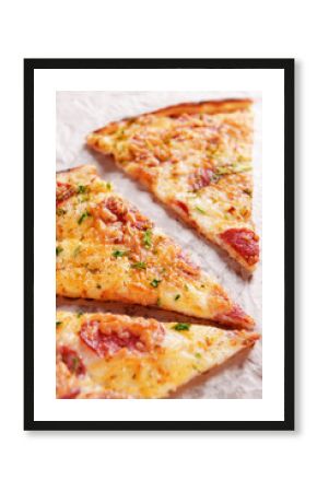 Tasty pizza on paper close up