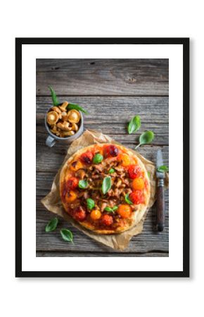 Tasty pizza on old wooden rustic table