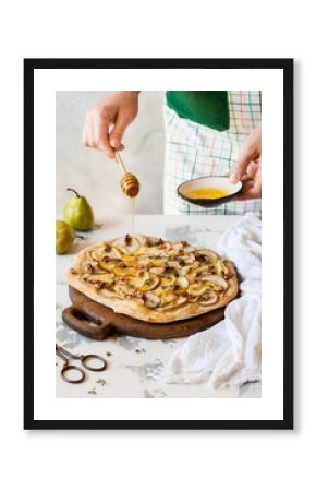 Female Drizzling Pear Pizza with Honey