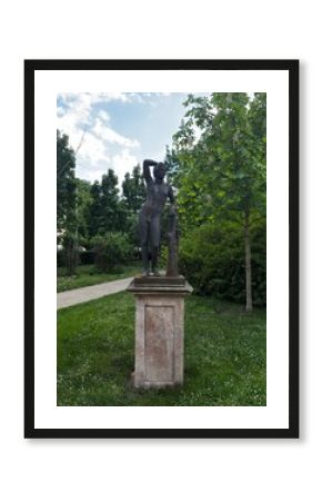 metal statue of a naked man 