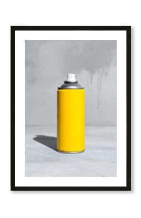 Vibrant yellow aluminum spray paint can with a white nozzle and silver top.