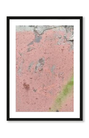 A crumbling pink stucco wall with a faded, coarse texture and green spray paint marks, a vibrant urban decay background for edgy designs or street-style content.