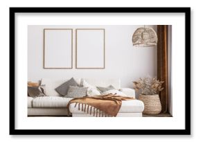 Frame mockup in bright living room design, white sofa in farmhouse boho interior style, 3d render