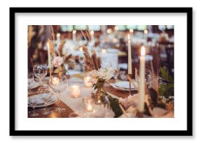 rustic wedding decorations with flowers and candles. banquet decor. picture with soft focus