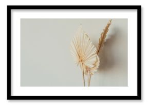 Fan leaves made of craft paper on white background. Minimal floral concept.
