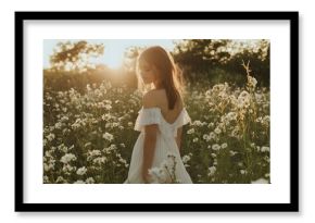 outdoors portrait of the young girl in white dress in the nature on the field full of flowers in the summer