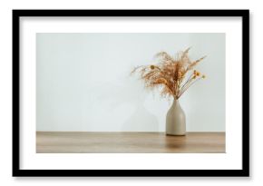 Dried flowers pampas grass in the ceramic vase