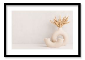 Wheat ears in a stylish modern vase, Scandinavian interior decoration concept, banner, copy space