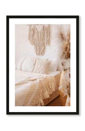 Bright boho style bedroom with macrame decor.