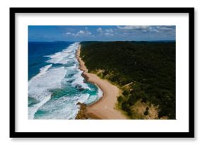 St Lucia South Africa, Rocks sand ocean, and blue coastal skyline at Mission Rocks beach near Cape Vidal in Isimangaliso Wetland Park in Zululand. South Africa St Lucia