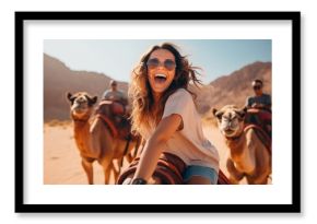 Happy Woman riding camel in sand desert