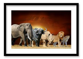Big five on savanna landscape background and Mount Kilimanjaro at sunset