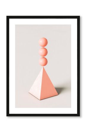 Pink abstract pyramid with three spheres balancing on top against cream colored background