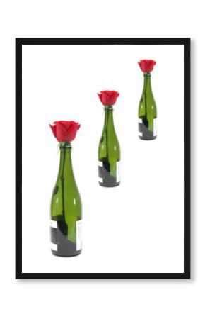 Botellas de champaña y rosas