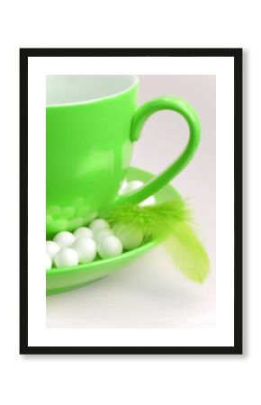 green mug on white background
