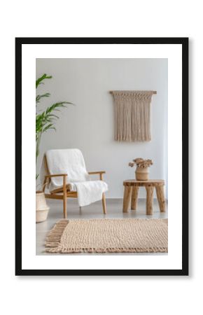 Interior design composition with a living room area in boho style with natural lighting and neutral colors. Residential interiors with chic decor.