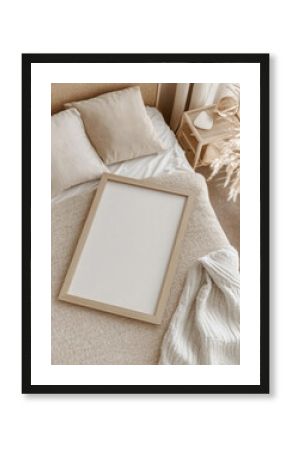 Mockup frame in bedroom interior background, light bohemian room, 3d render  