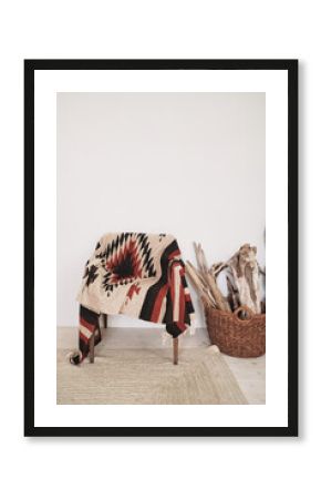 chairs in the boho room with carpet and wood