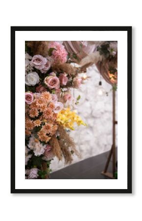 Beautiful unusual boho chic wedding arch for outside ceremony