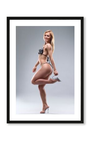 athletic woman with beautiful figure in bikini