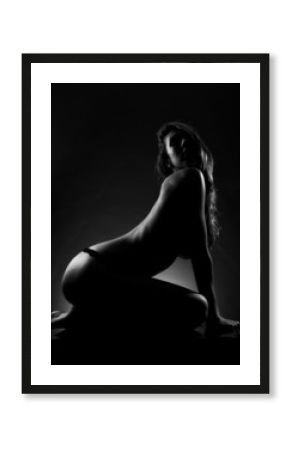 Silhouette of nude woman