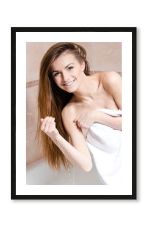 Portrait of the girl sitting in a bath