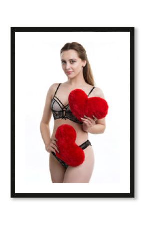 Valentine's Day. Young girl. Two red hearts. Love. Nude. Holding a heart.