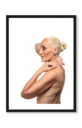 Senior Female People Concepts. Portrait of  Senior Nude Woman With Hands Lifted. Against White Background.