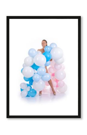 Nude girl with balloons posing on a white background.