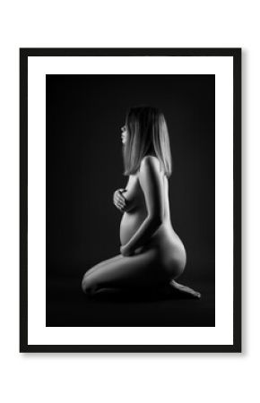 Beautiful naked pregnant woman, black and white photography, pregnancy nude art concept