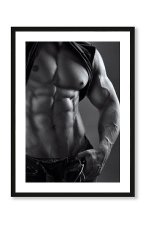 black and white image of a muscular male torso
