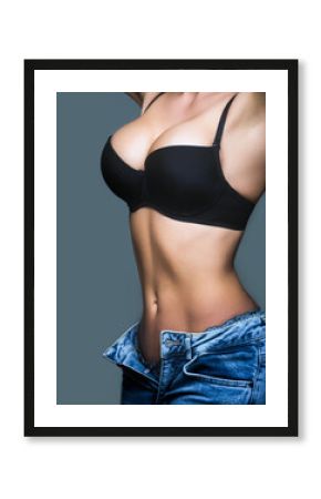 Woman big natural sexy boobs in lingerie. Plastic surger. Beautiful woman body, sexy belly, abdomen. Sexy female boob in black bra. Sexy boob