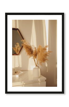 Pampas grass in vase on the dresser