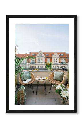 Vertical shot of open terrace or balcony on roof of hotel with cityscape view