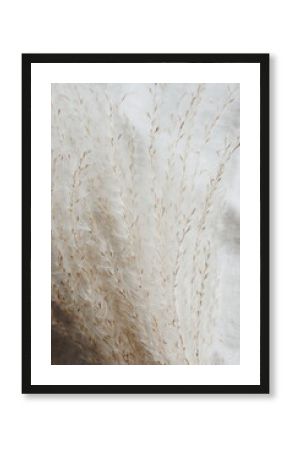 pampas grass neutral beige color on beige linen texture background close up. Plant texture. Poster. Scandinavian, boho, modern minimalistic  home design.