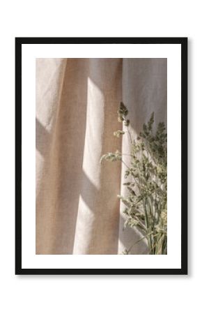 Sunlight shadows on beige linen curtain, meadow grass bouquet, aesthetic summer boho background with sun ray