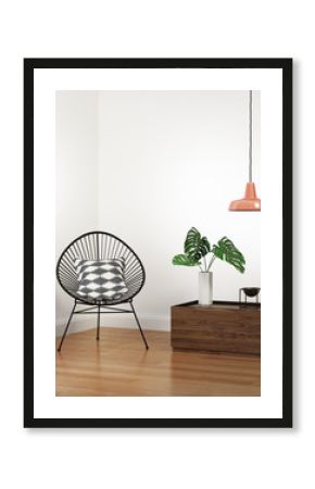 Boho interior with wired chair and low table