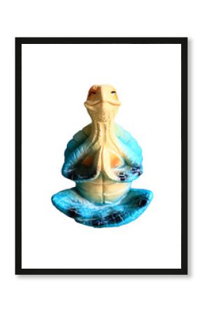 A figurine of a turtle perched on its shell, a simple and cute scene