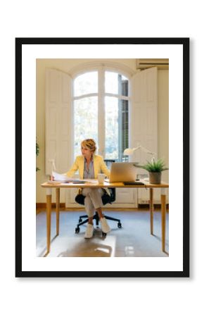Businesswoman with concentration working in office
