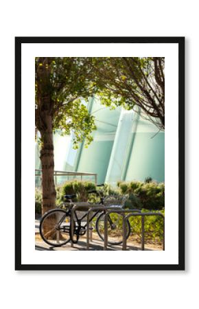 Bicycle parked in an ecological environment with contemporary architecture