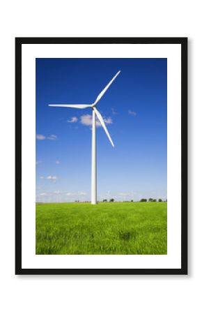 Windmill against blue sky