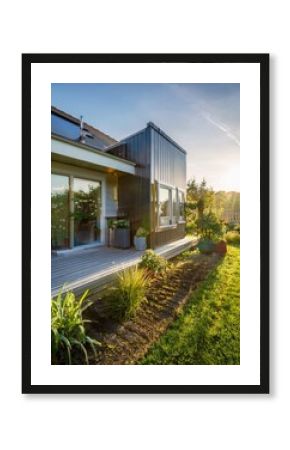 modern tiny house with a garden and a small backyard