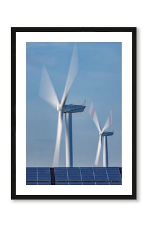Solar panels and spinning wind turbines