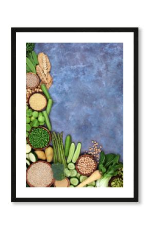 High fibre green and yellow food for gut health with fruit, vegetables and grain products on mottled blue. Also high in antioxidants, protein, omega 3, smart carbs, vitamins and minerals 